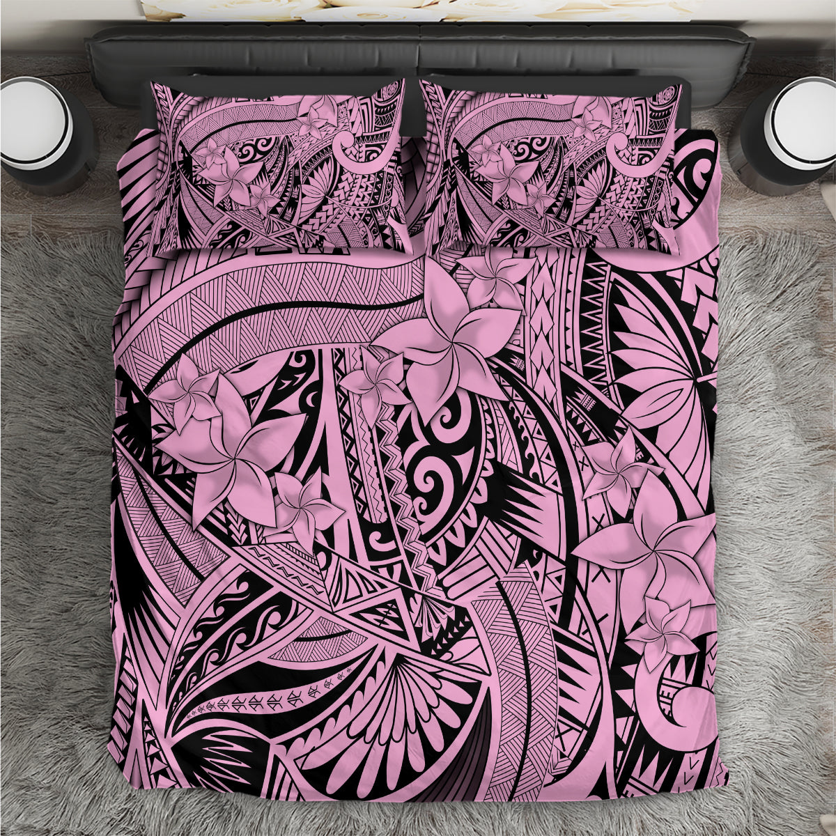 Pink and black tribal floral bedding set with ornate curved medallion pattern.