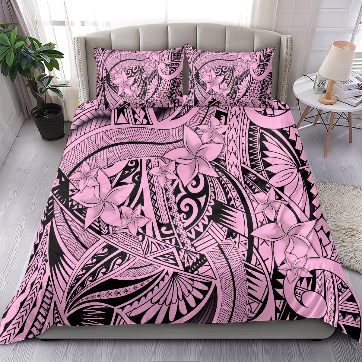 Pink and black tribal flower bedding set shown on a bed with matching pillowcases.