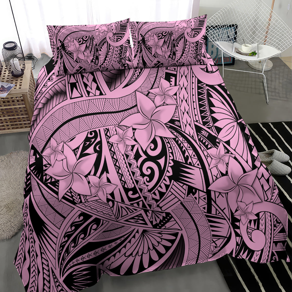 Pink and black tribal floral bedding set detail, featuring hibiscus-style flowers and swirls.