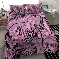 Pink and black tribal floral bedding set detail, featuring hibiscus-style flowers and swirls.