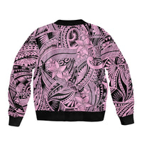 Pink bomber jacket with tribal floral print, ribbed black hem and sleeve cuffs
