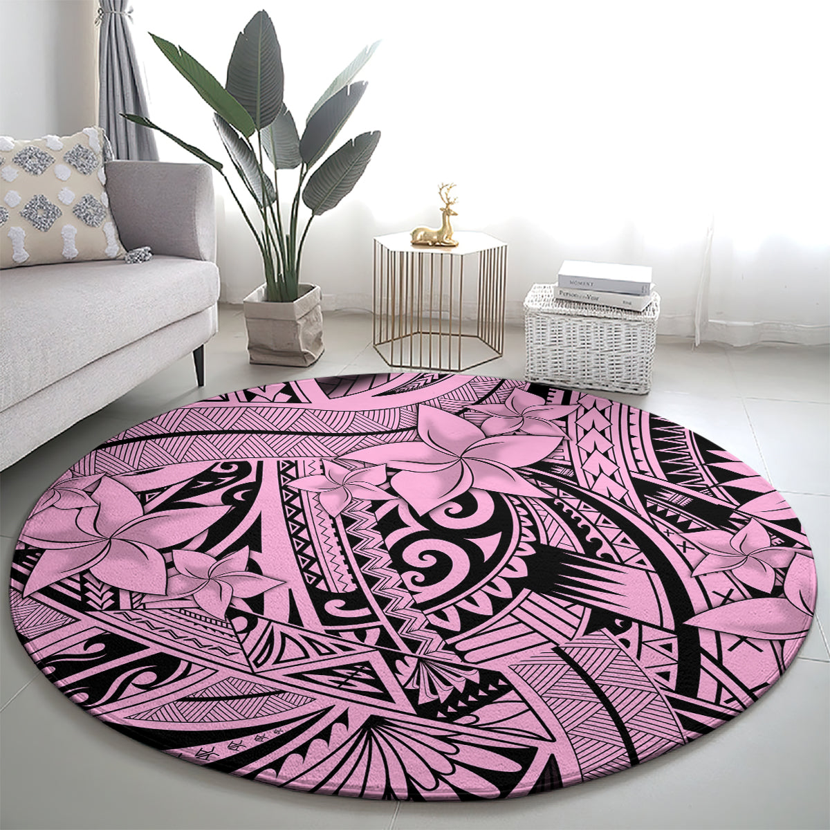 Round pink tribal rug with central swirl design and floral motifs in purple and black