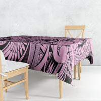 Pink and purple tribal tablecloth with leaf and geometric pattern, draped over table