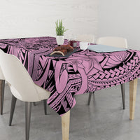 Pink and purple Polynesian-style tablecloth with bold tribal pattern and floral elements