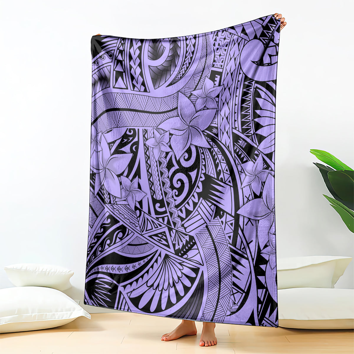 Violet tribal blanket with floral and geometric patterns, draped over bed