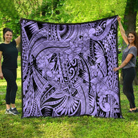 Violet tribal quilt draped outdoors, featuring black lines and tropical flower motifs