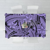 Violet tablecloth with bold black tribal patterns and purple floral motifs