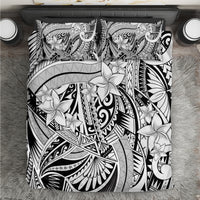 Black-and-white tribal bedding set with white flower print and matching pillowcases
