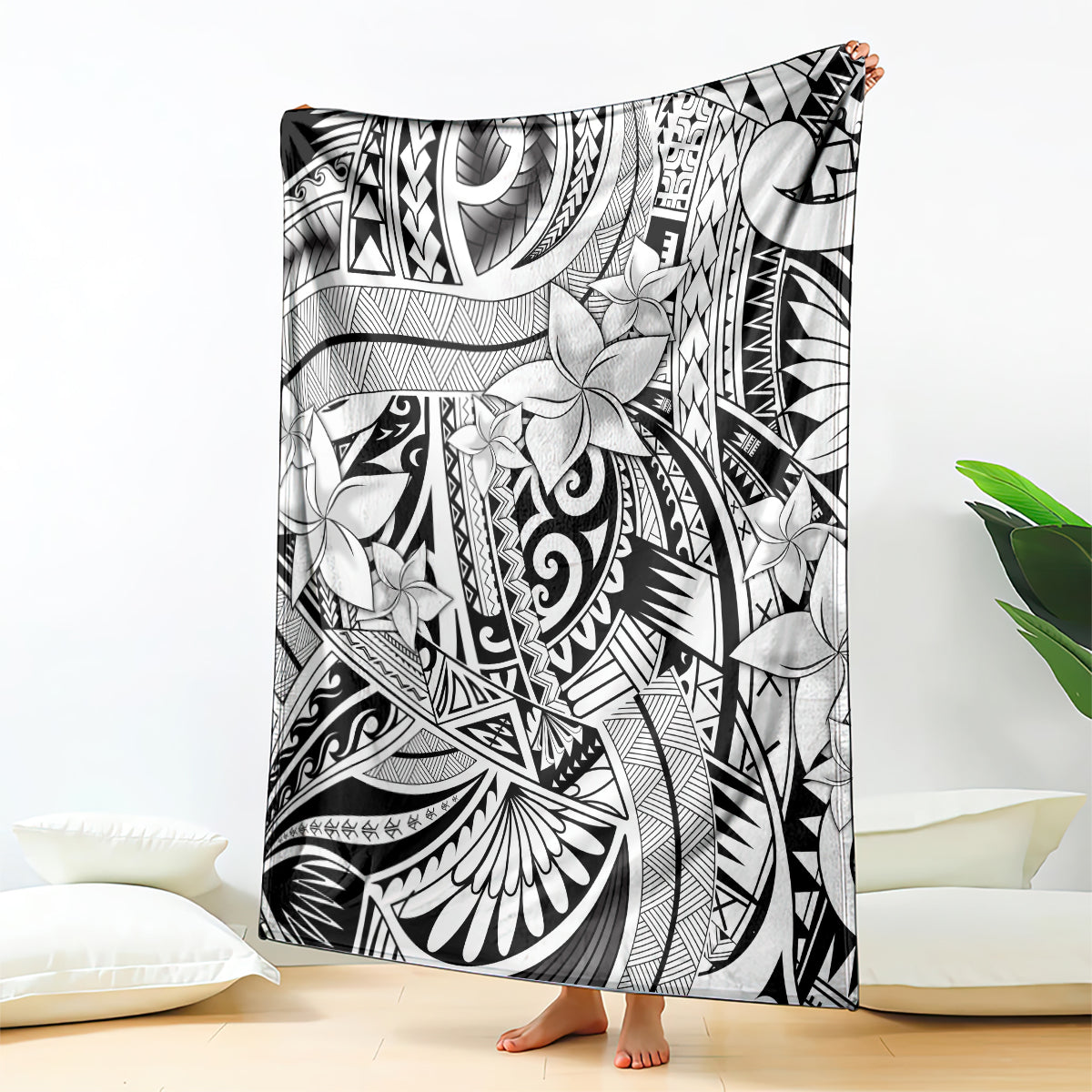Black and white tribal floral blanket with bold Polynesian-inspired patterns, fringed edge
