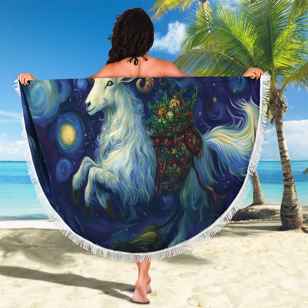 Round fringed beach blanket with goat-and-stars artwork held on the beach