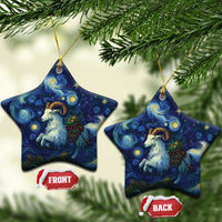 Two blue ceramic goat starry night ornaments, star shape with gold hanging loops