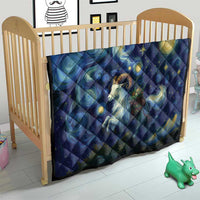 Dark blue starry night quilt on a toddler bed, goat and golden stars visible
