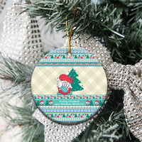 Round ceramic Christmas ornament with gnome illustration and multicolor border, hanging