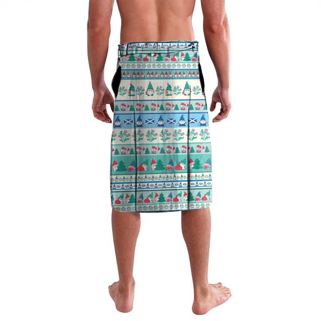 Christmas patterned wrap skirt in mint blue with gnome and tree graphics, back view