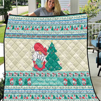 Christmas musical quilt blanket with snowman and green tree, white quilted center, mint blue trim