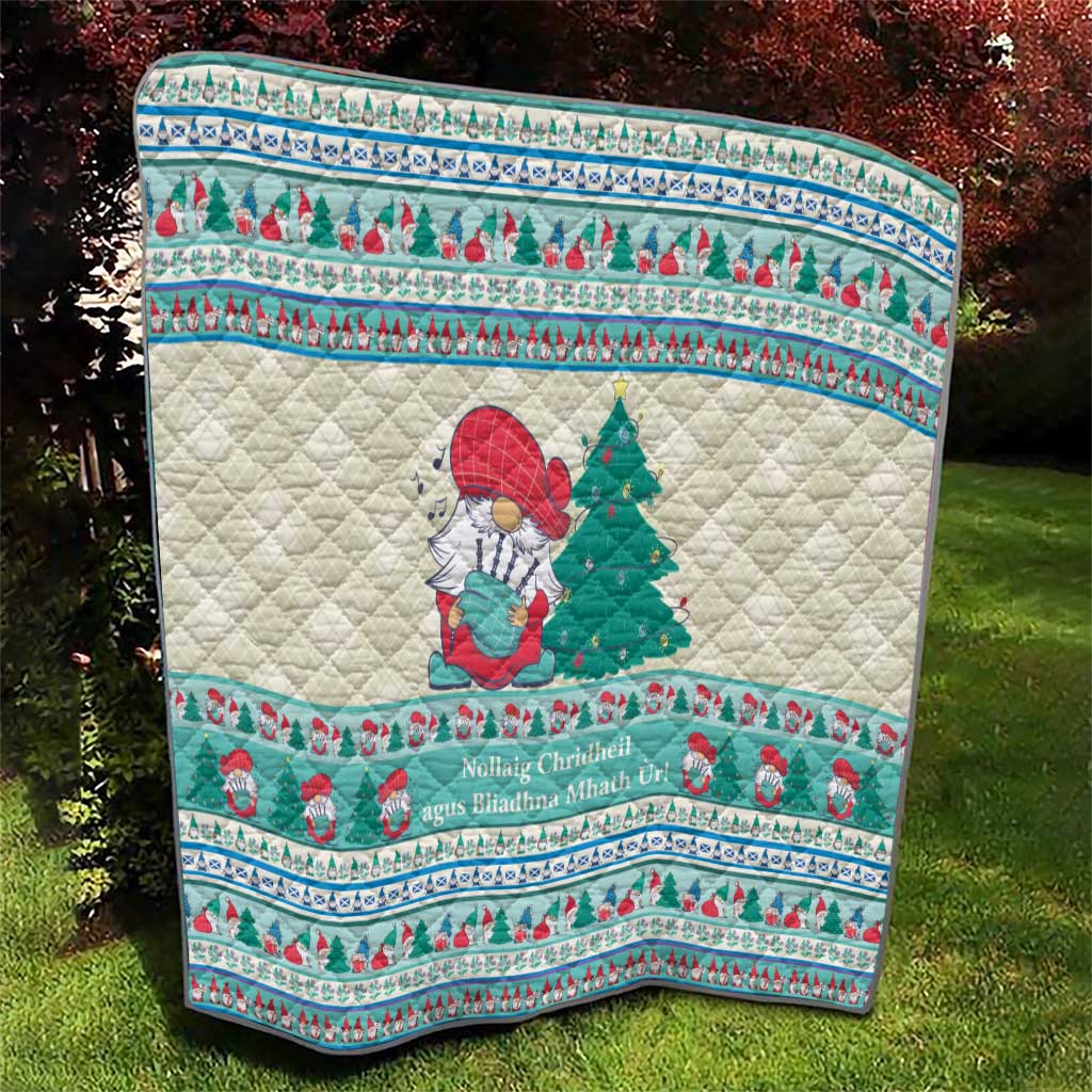 Quilted Christmas blanket with snowman holding music, framed by red and mint blue border