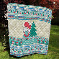 Quilted Christmas blanket with snowman holding music, framed by red and mint blue border