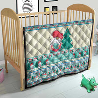 Quilted Christmas crib blanket with snowman and tree artwork and mint blue border