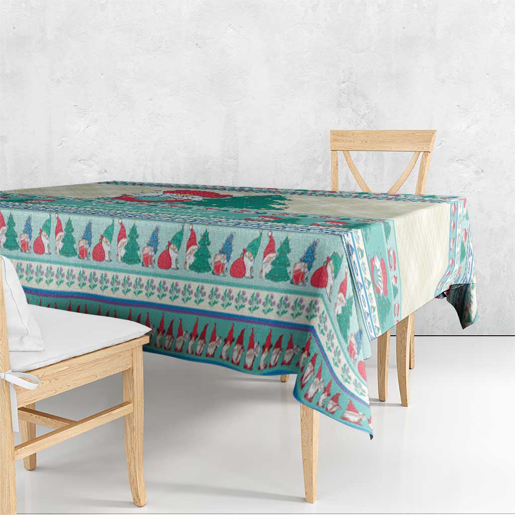 Christmas gnome tablecloth corner drape in mint blue teal with tree and stripe motifs.