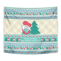 Close-up Christmas tapestry design with gnome, pine tree, and mint blue decorative bands