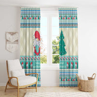 Two Christmas curtain panels with mint blue pine tree motif and gnome border stripes