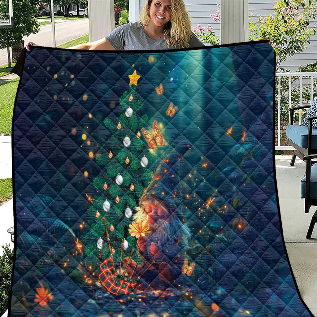 Dark blue quilt blanket with glowing Christmas tree lights and ornaments, diamond stitching