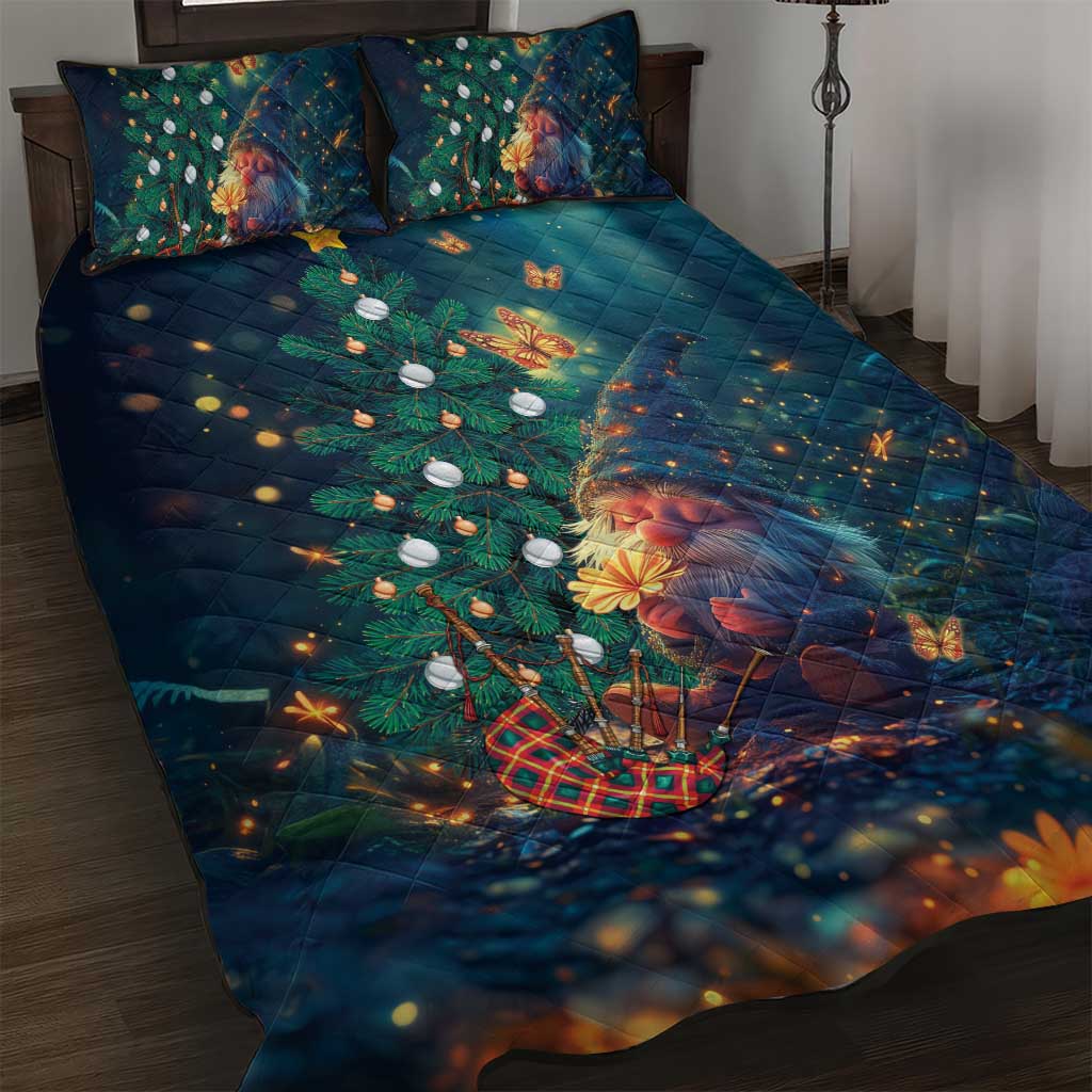 Dark blue quilt bed set with festive gnome, Christmas tree, lights, and two pillows