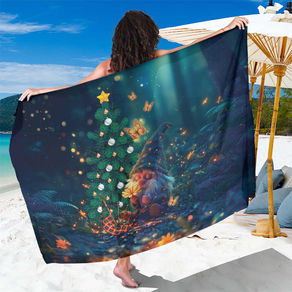 Christmas gnome sarong in dark blue, held open with tree and lights design