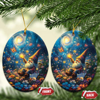Pair of blue ceramic oval ornaments with Scottish gnome scene and gold hanging loops