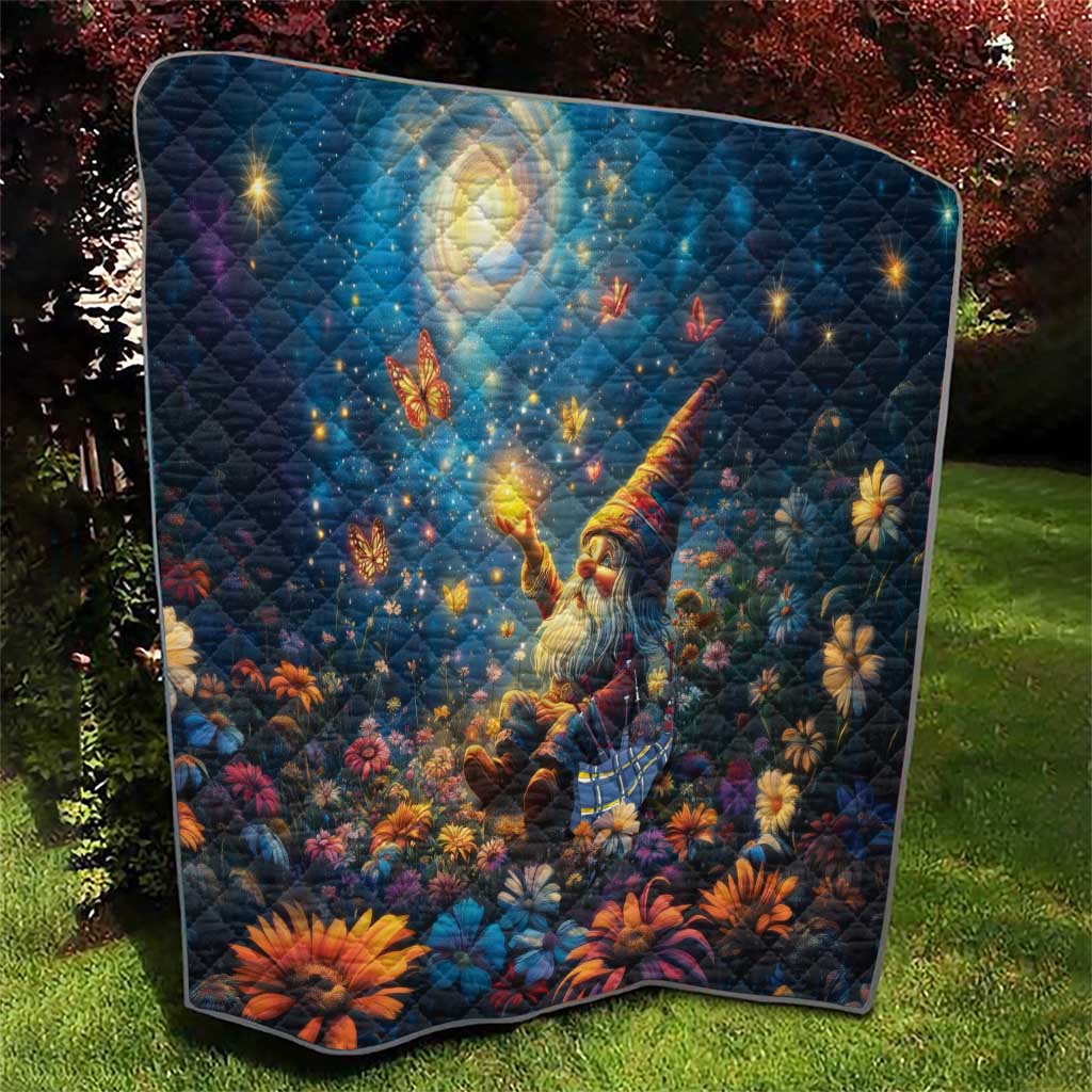 Blue quilt blanket with diamond quilting, glowing moon, angel, and multicolor flowers