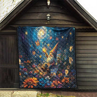 Blue quilt blanket with starry angel, glowing moon, and colorful floral pattern