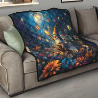 Blue quilt blanket with starry angel scene and vibrant orange floral accents