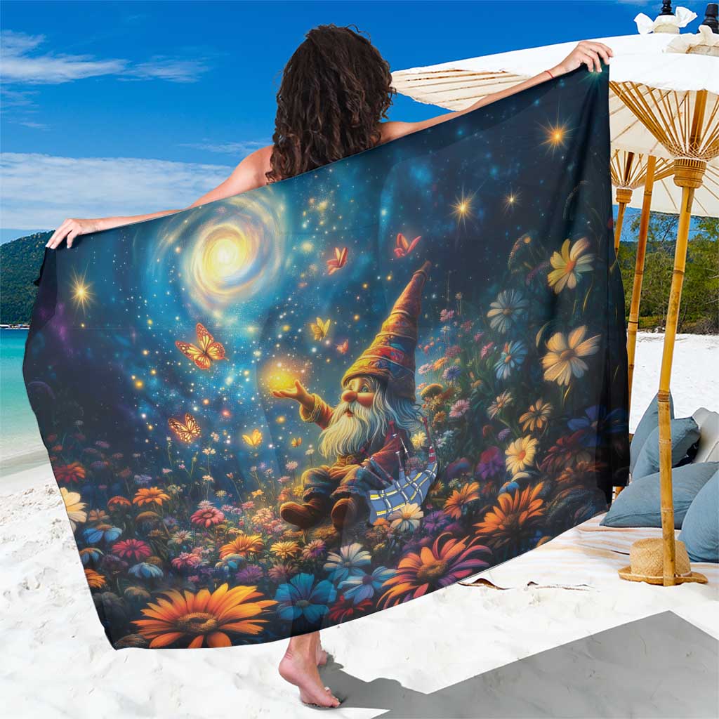 Dark blue sarong with starry night gnome, colorful flowers, and draped wrap styling