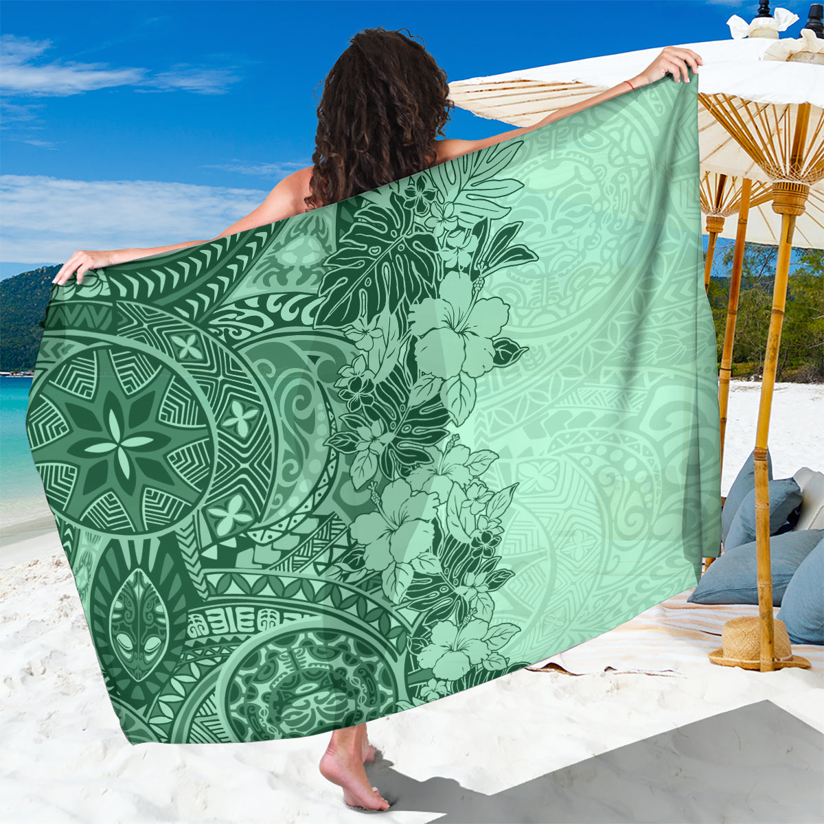 Green floral sarong with hibiscus and tribal tattoo style patterns