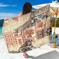 Beige sarong with tribal print and red, black, and leaf motifs; wrap styling