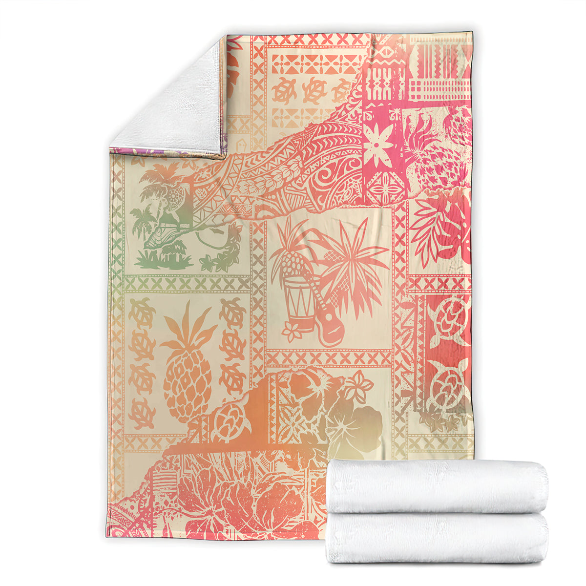 Folded pink ombre tropical blanket with patchwork floral and tiki motifs