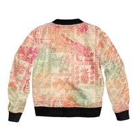 Unisex bomber jacket, back view, pink patchwork aloha print with black ribbed hem and cuffs