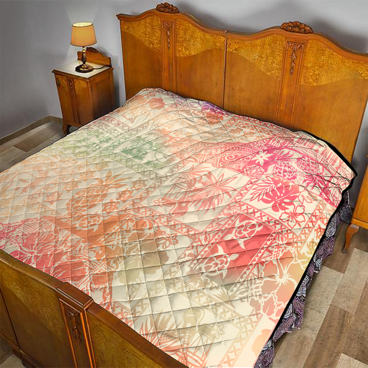 Hawaiian quilt blanket on bed with pink coral, cream ombre tribal pattern and diamond quilting
