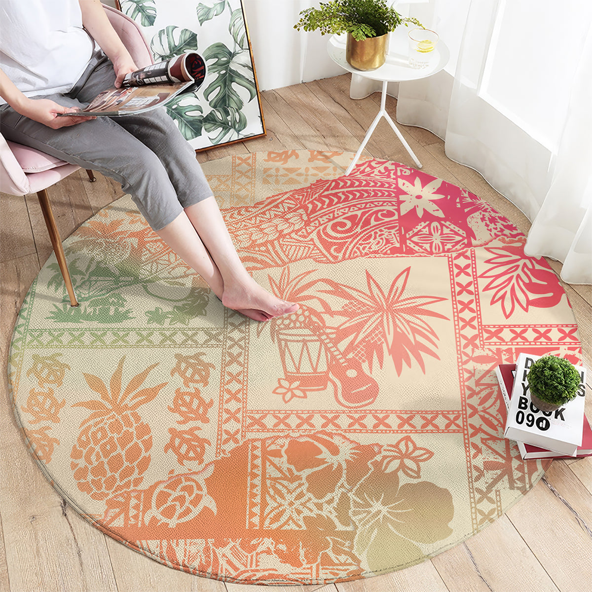 Round pink ombre rug with tribal island motifs and animal silhouettes