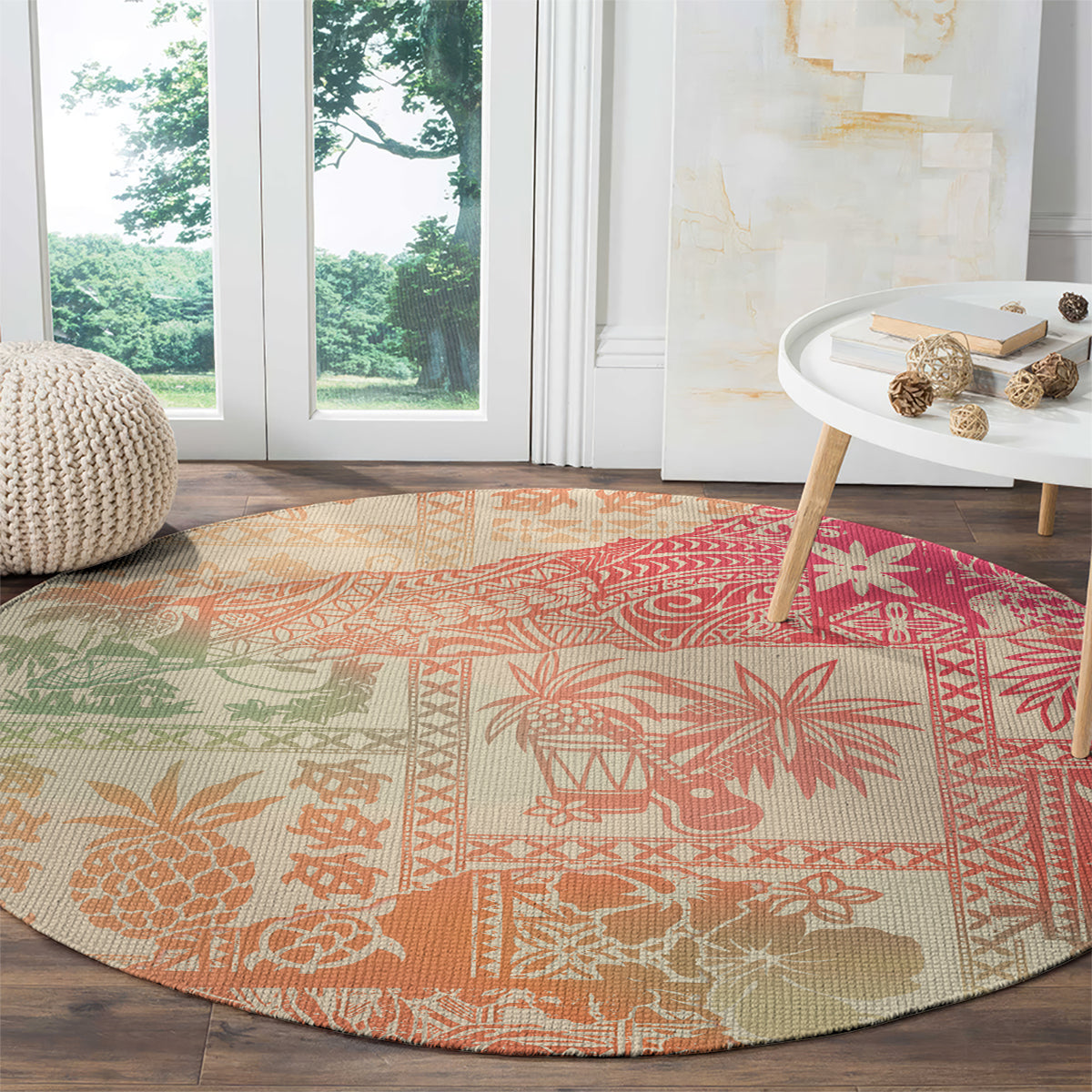 Round pink ombre rug with tribal pattern, floral accents, and geometric borders