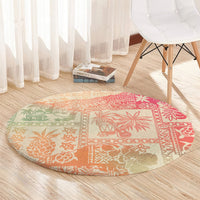 Round pink ombre rug with tribal island motifs and textured woven look