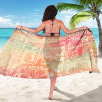 Pink ombre tribal-pattern sarong wrap, shown from back with ties at waist.