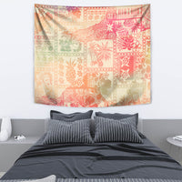 Rectangular tapestry in pink-to-orange ombre with tribal collage blocks and island icons