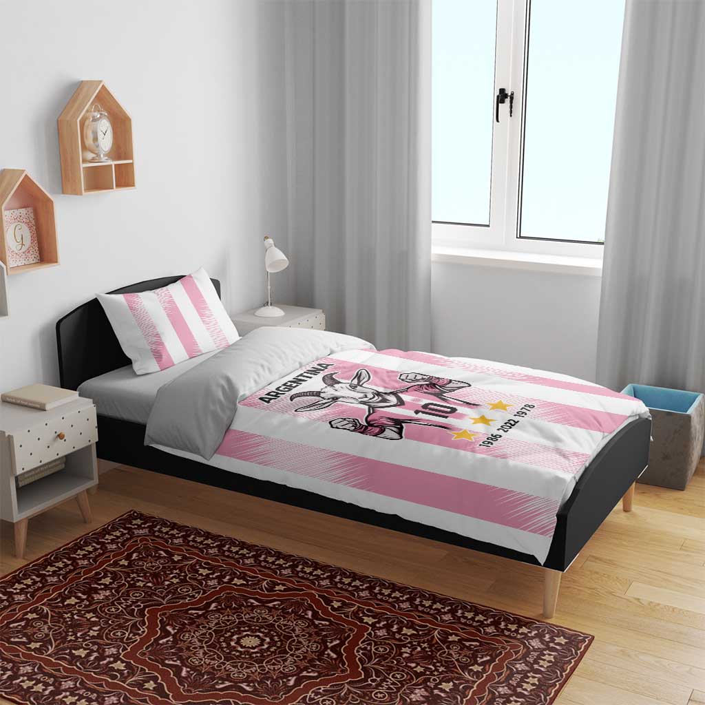 Pink Argentina goat bedding set on bed with striped duvet and pillowcases, goat 10 stars