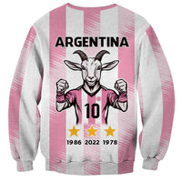 Pink and gray crewneck sweatshirt with Argentina text, goat graphic, stars, years, 10