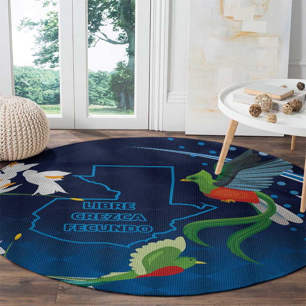 Blue round carpet with bird and dinosaur artwork and blue text logo in the center.