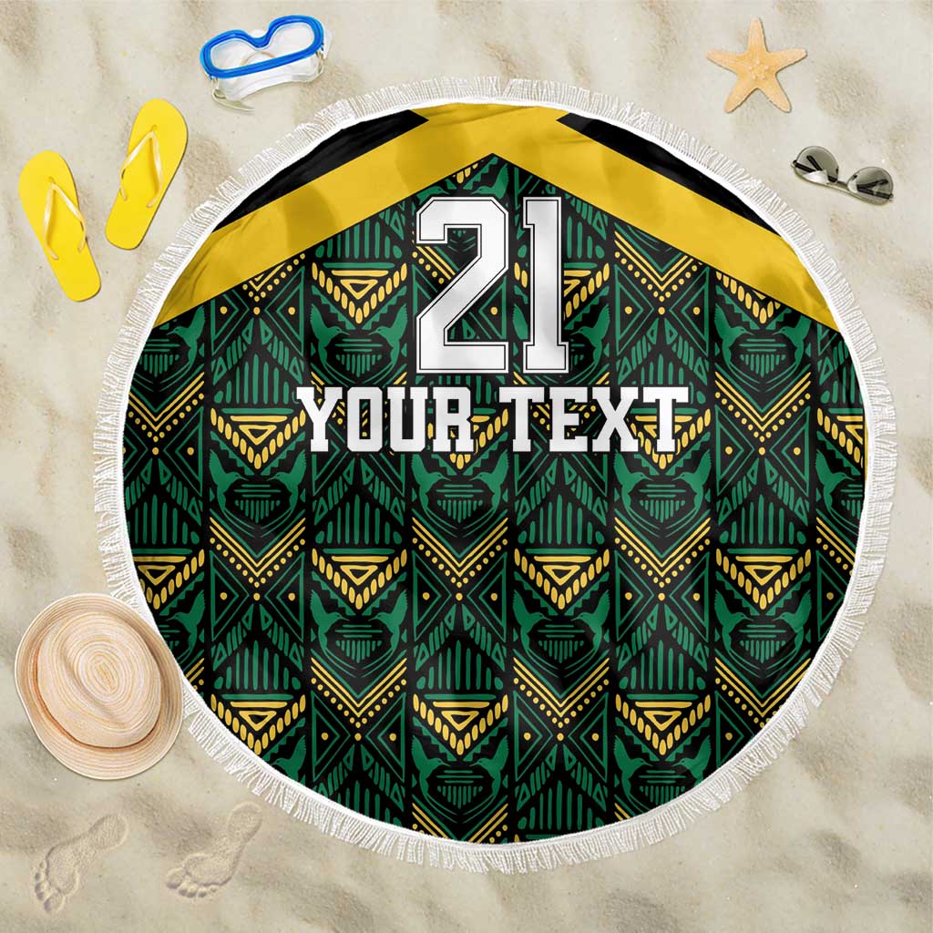 Round beach blanket with fringed edge, green ethnic pattern and custom text “YOUR TEXT”.