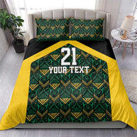Bedding set on bed with black and green/yellow ethnic motifs, number 21 and Your Text