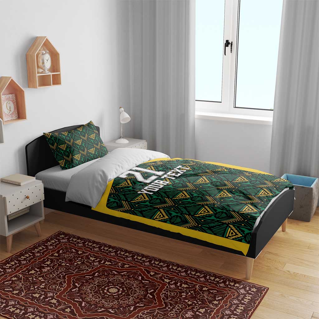 Bedding set on bed with black and green/yellow ethnic duvet, yellow stripe, number 21, Your Text