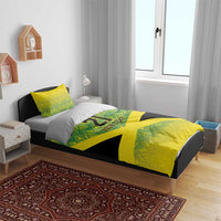 Yellow and green patterned duvet with black cross and '21 Your Text', with two matching pillows